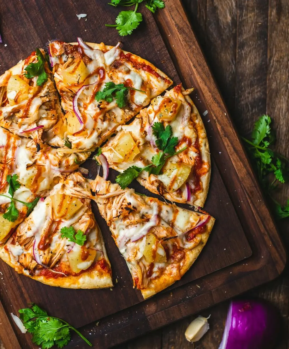 Wood-fired pizza on a board